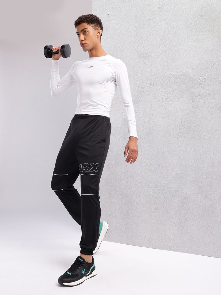 HRX by Hrithik Roshan Men Brand Logo Print Rapid-Dry Training Joggers with Contrast Piping