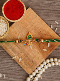 eCraftIndia Green Om & Peacock Feather Religious Rakhi with Roli Chawal