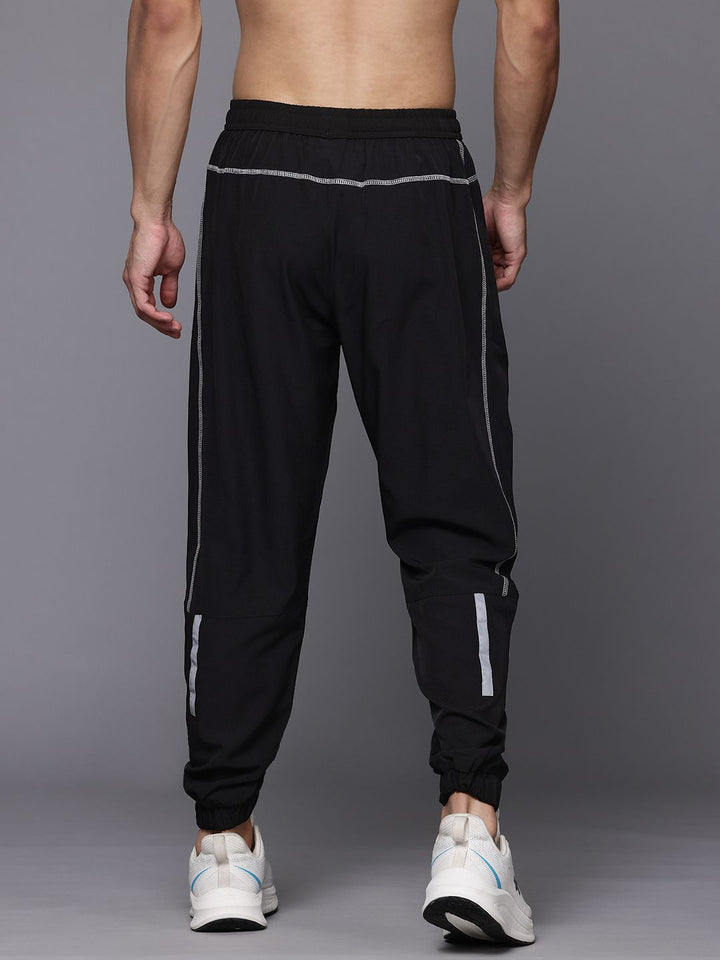 HRX oleh Hrithik Roshan Men Mid-Rise Training Joggers dengan jalur reflektif
