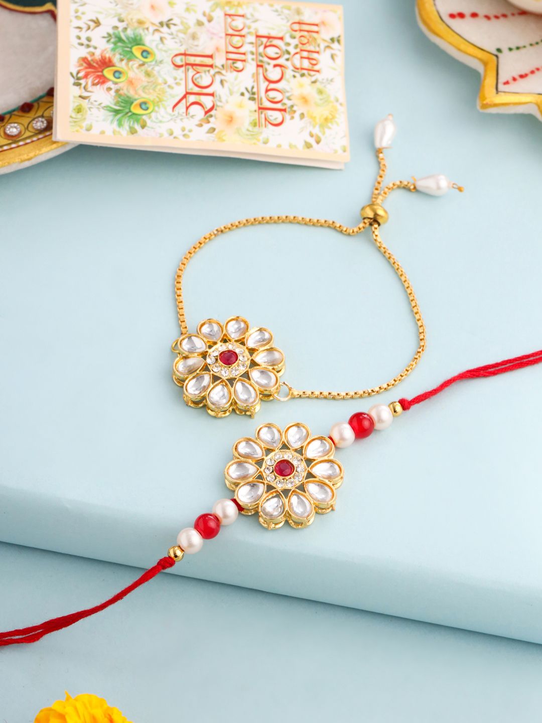 NVR Set of 2 Gold Toned Kundan Studded Bhaiya Bhabhi Rakhi Set with Roli Chawal