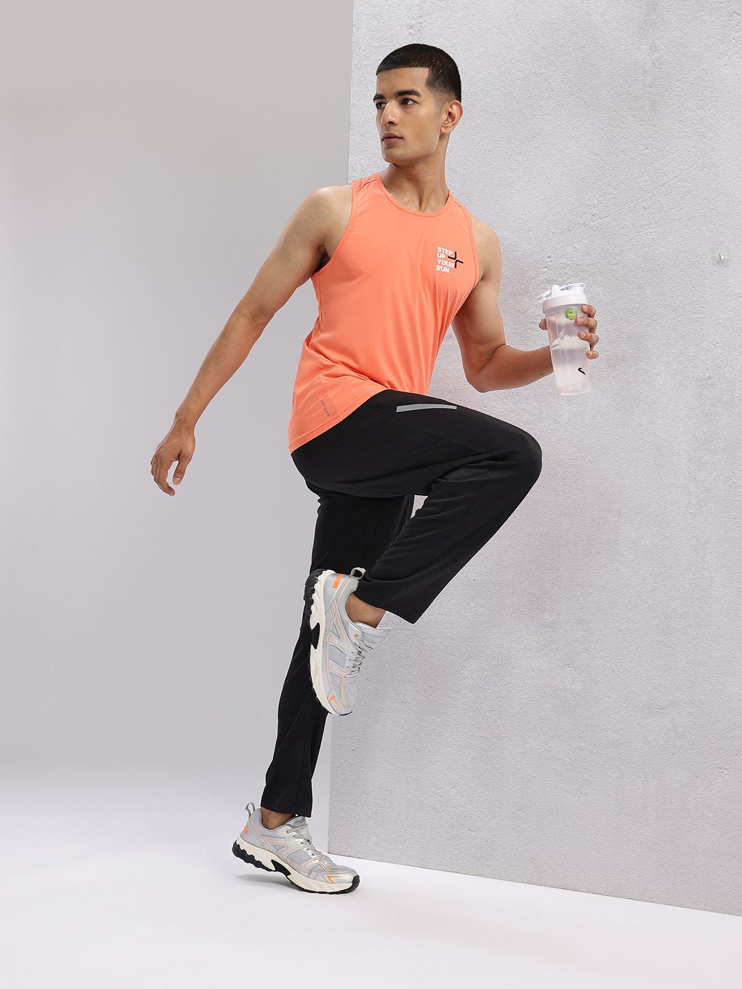 HRX by Hrithik Roshan Men Rapid-Dry Mid-Rise Regular Fit Running Track pants