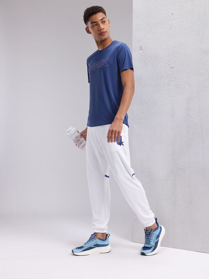 HRX by Hrithik Roshan Men Mid-Rise Brand Logo Print Rapid-Dry Running Joggers