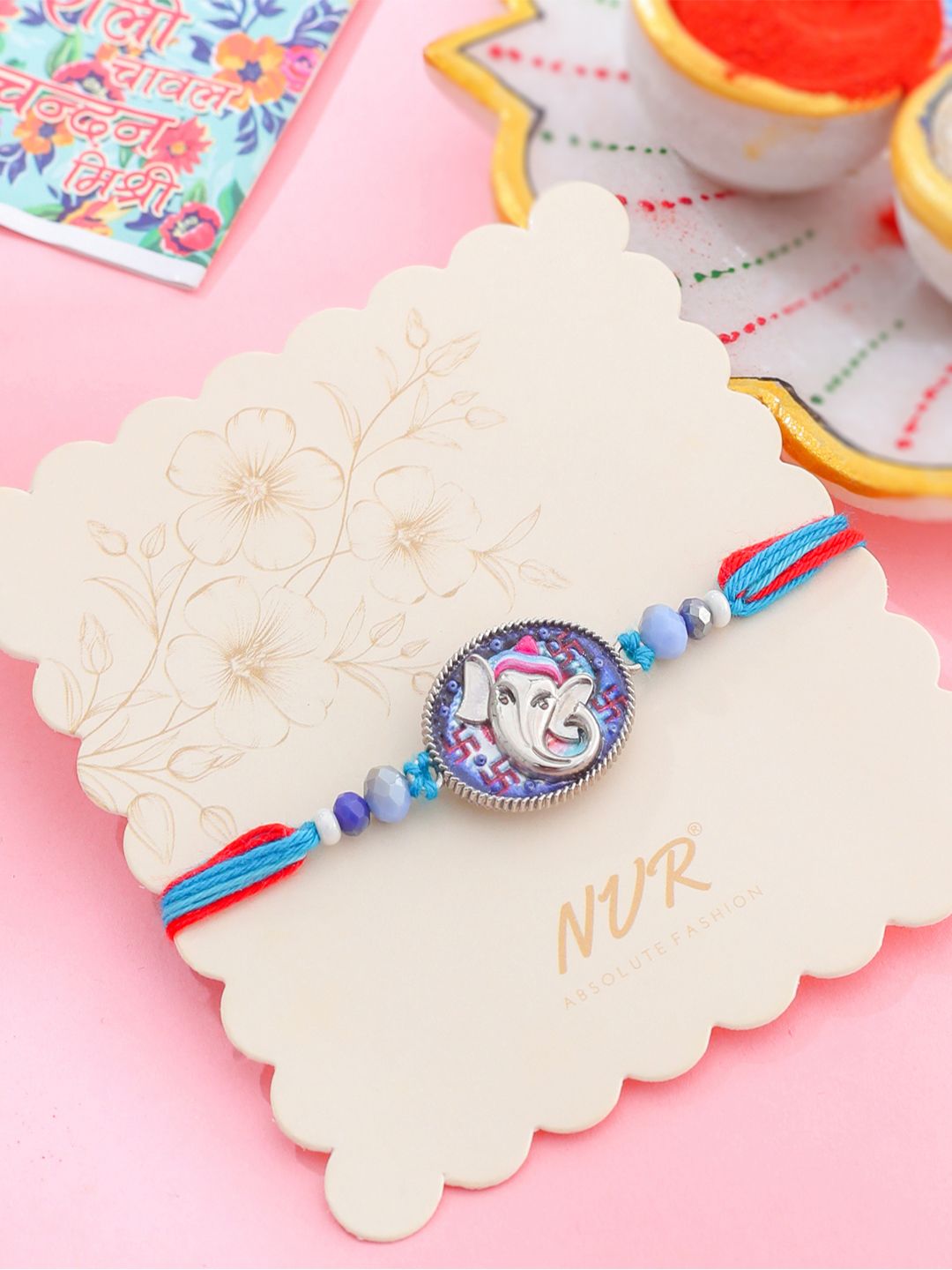 NVR Unisex Red & Blue Ganesh Ji Thread Rakhi With Roli Chawal