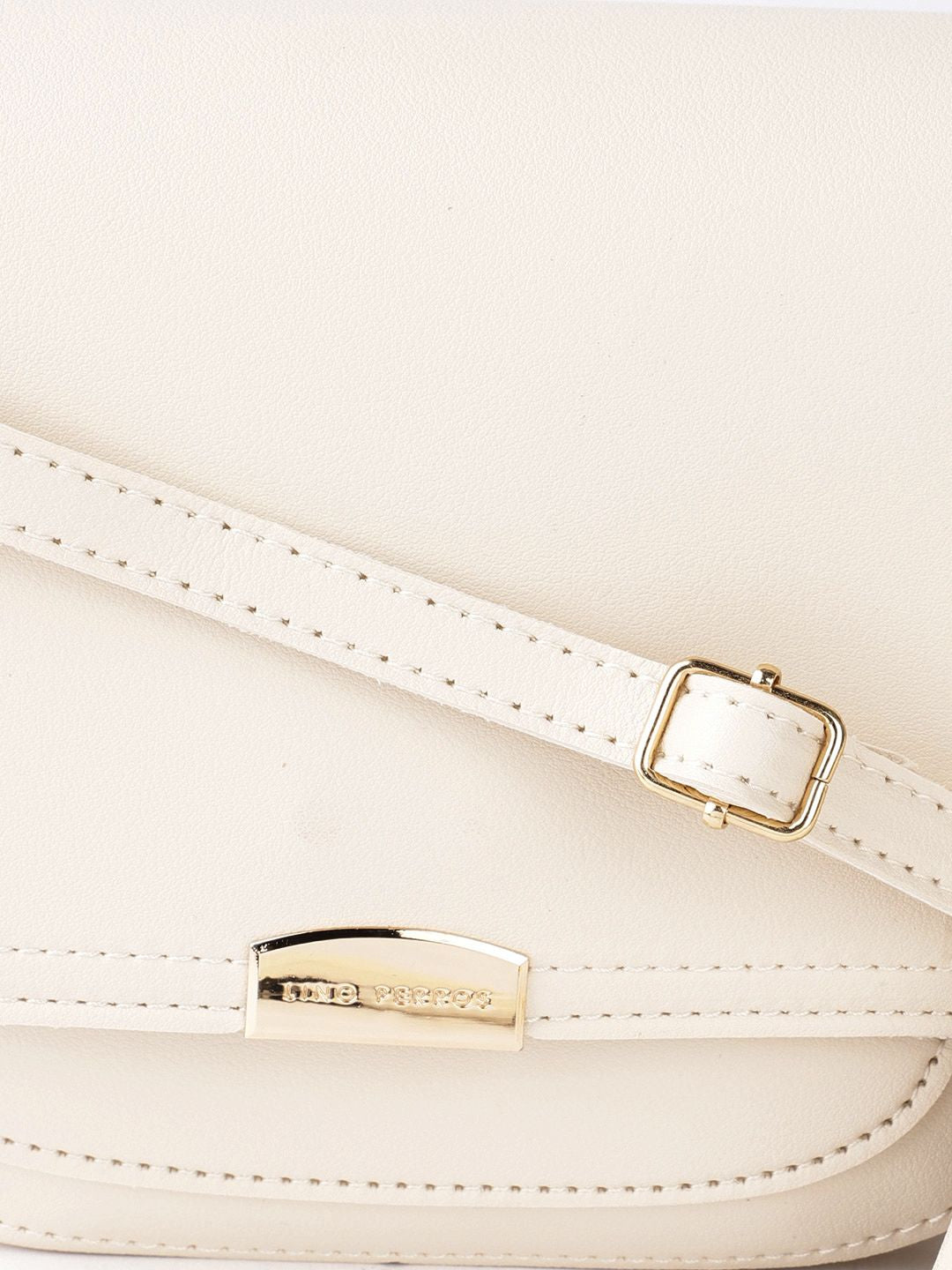 Lino Perros Women Cream-Coloured Solid Sling Bag with Tasselled Detail