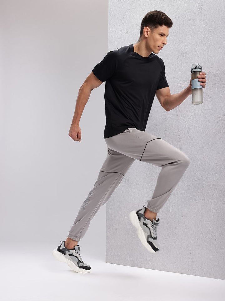 HRX by Hrithik Roshan Men Brand Logo Printed Rapid-Dry Running Joggers