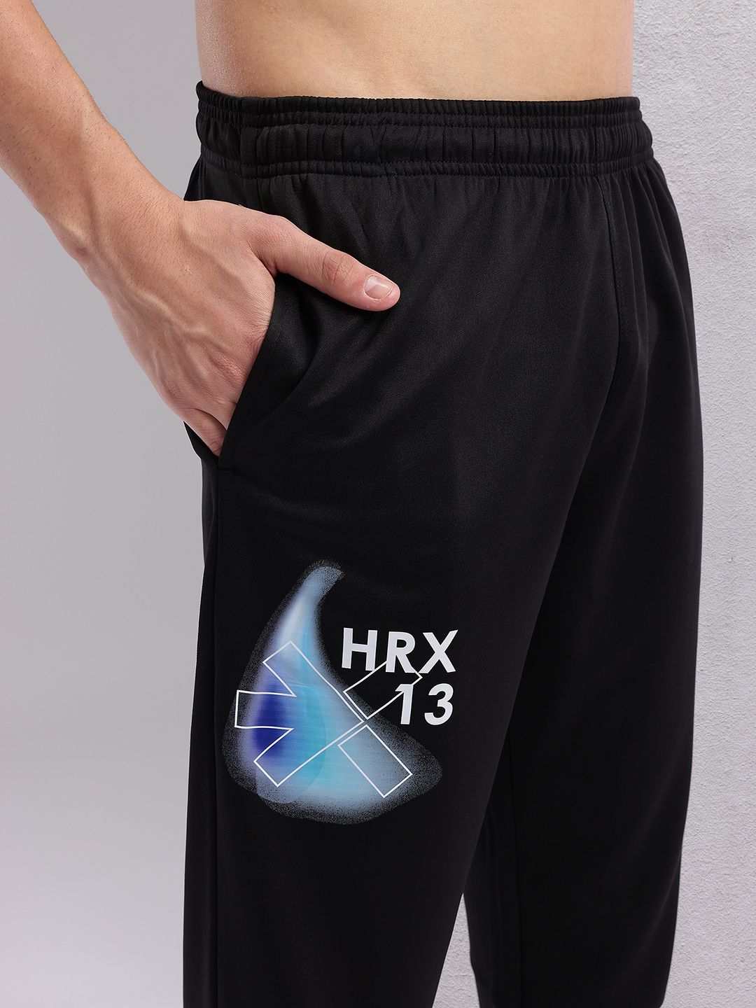 HRX by Hrithik Roshan Men Brand Logo Printed Mid-Rise Rapid-Dry Running Track Pants