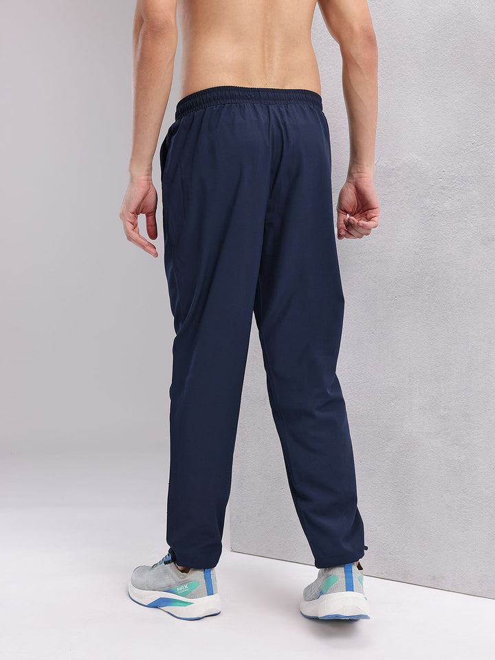 HRX by Hrithik Roshan Men Mid-Rise Rapid-Dry Running Track Pants with Toogled Hem