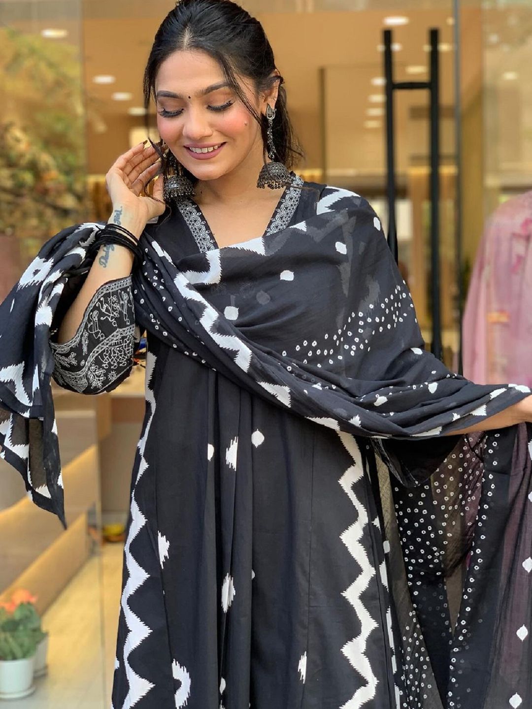 KALINI Geometric Printed Notch Neck Pleated A-Line Kurta With Trouser And Dupatta