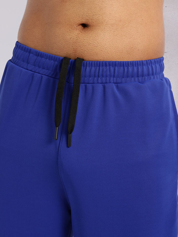 HRX oleh Hrithik Roshan Men Typography Cetak Perincian Mid-Rise Rapid-Dry Joggers
