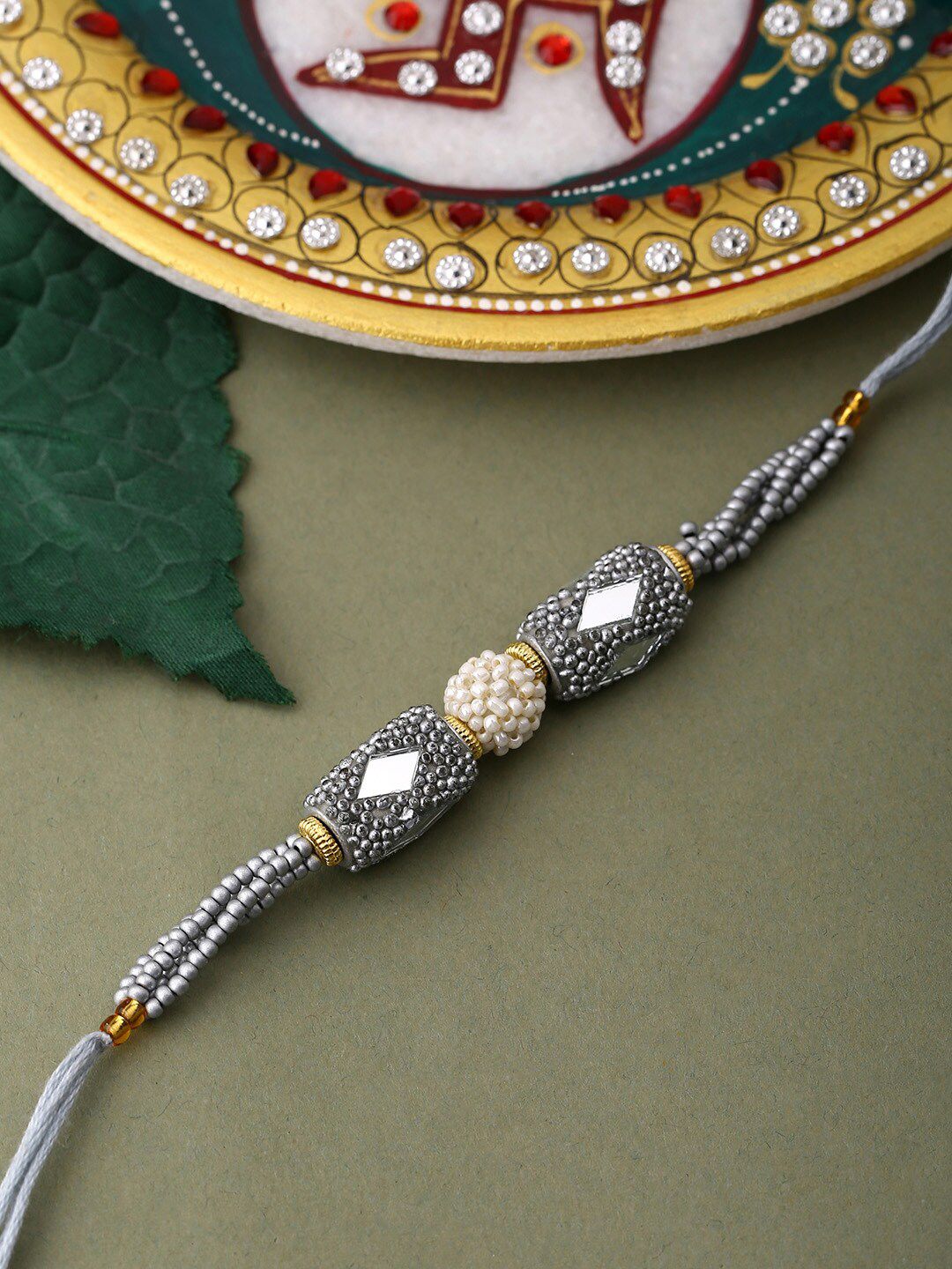Voylla Unisex Silver Beaded and Pearls Rakhi with Roli Chaawal Pack