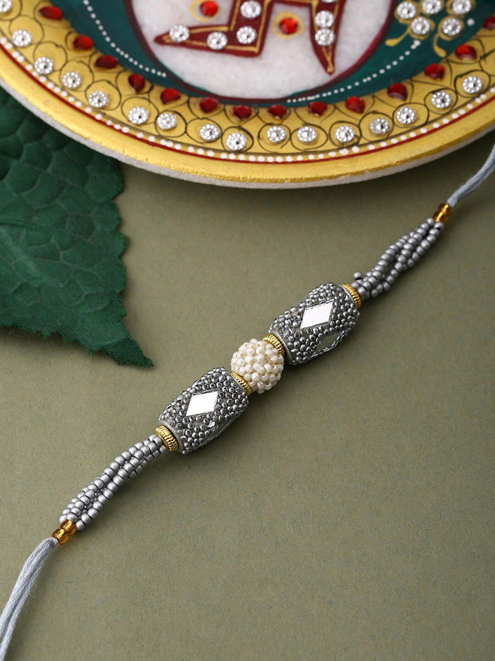 Voylla Unisex Silver Beaded and Pearls Rakhi with Roli Chaawal Pack