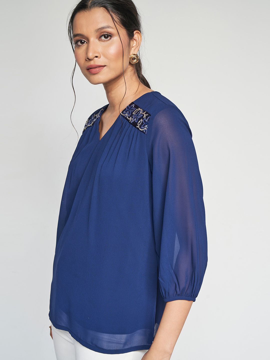 AND V-Neck Embellished Top