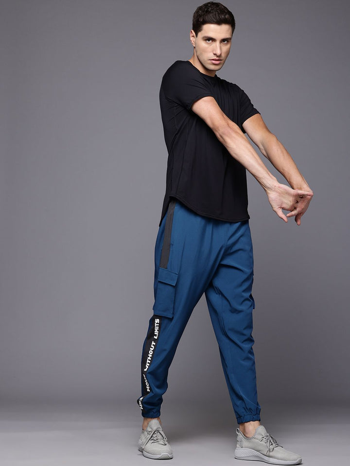 HRX by Hrithik Roshan Men Rapid-Dry Typography Print Training Joggers With Panel Detail