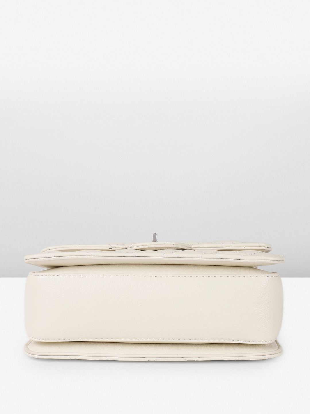 DressBerry Textured Structured Sling Bag with Quilted