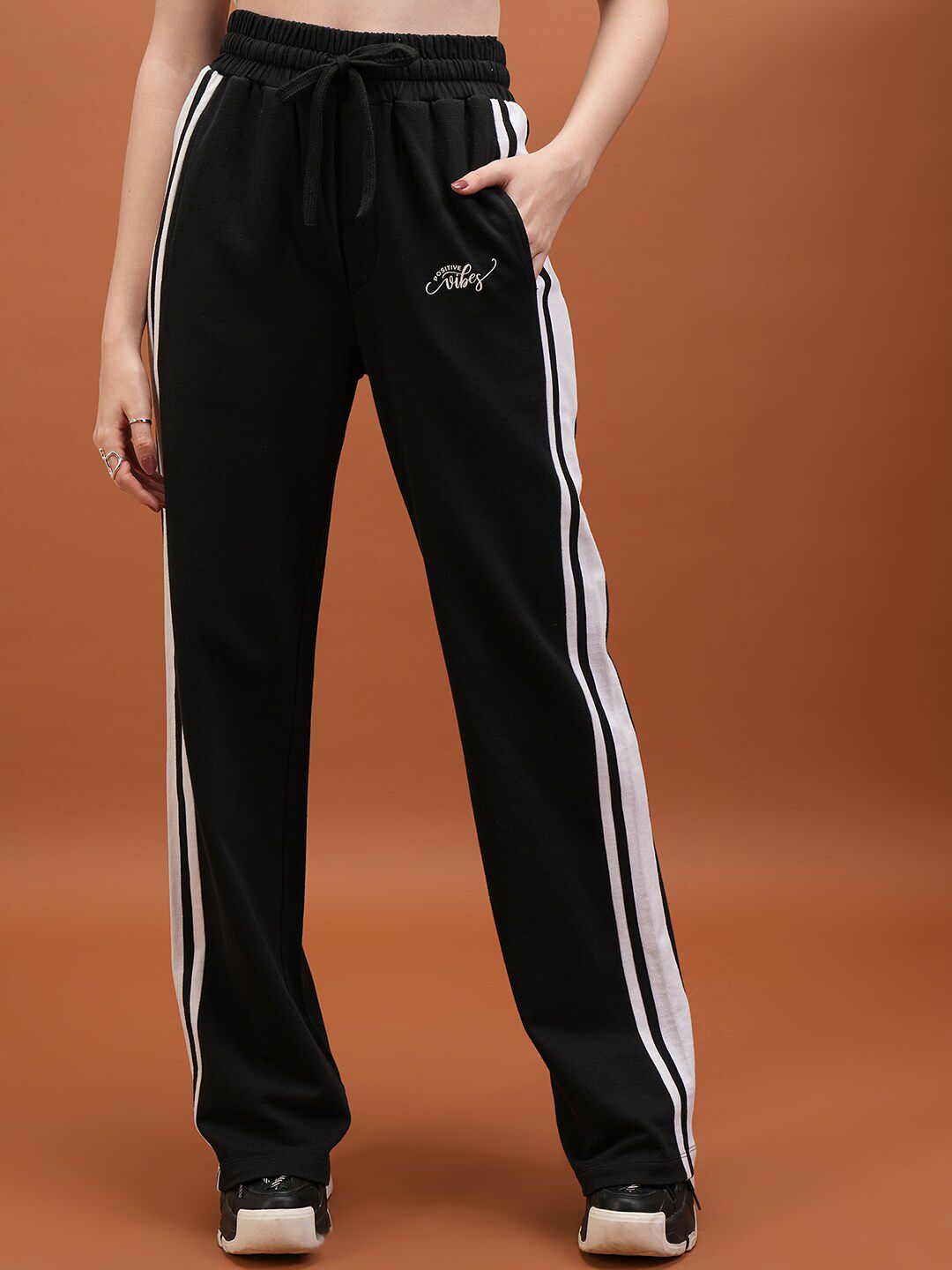 Tokyo Talkies Women Black Flared-Fit Mid Rise Track Pants