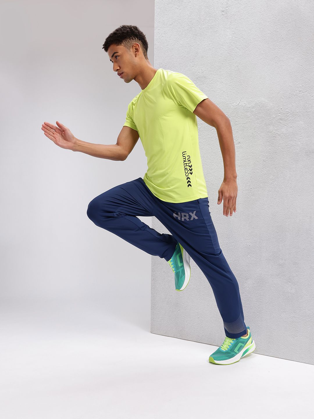HRX by Hrithik Roshan Men Brand Logo Printed Mid-Rise Running Track Pants