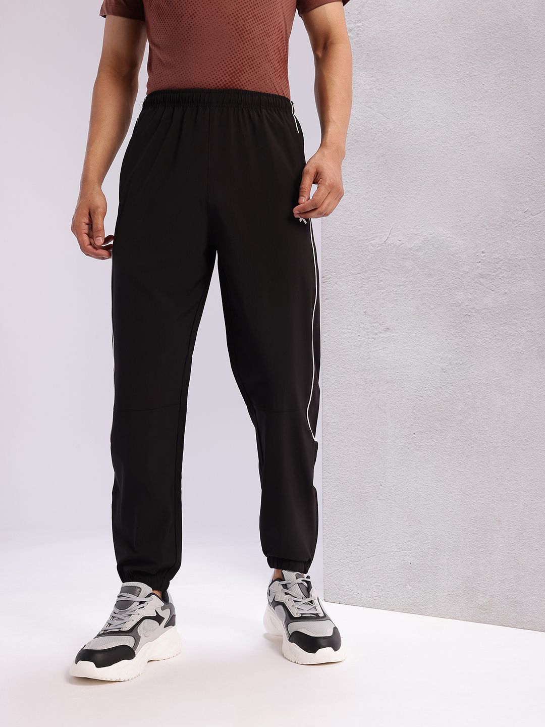 HRX by Hrithik Roshan Men Mid-Rise Rapid-Dry Lifestyle Track Pants