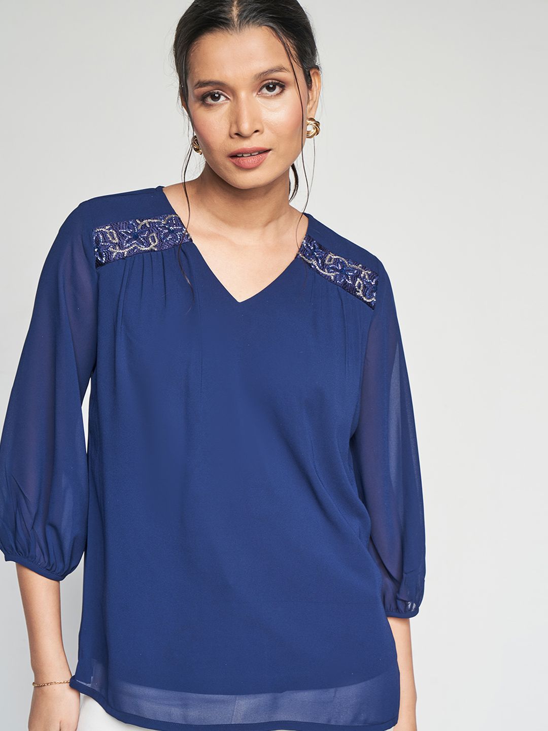 AND V-Neck Embellished Top