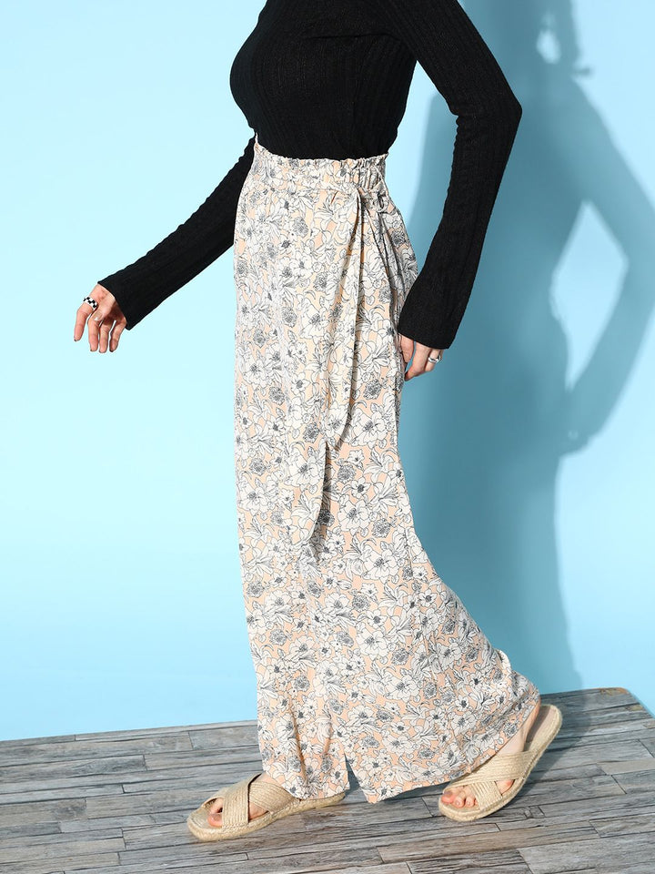 Berrylush Women Beige & White Floral Printed Relaxed Flared High-Rise Trousers