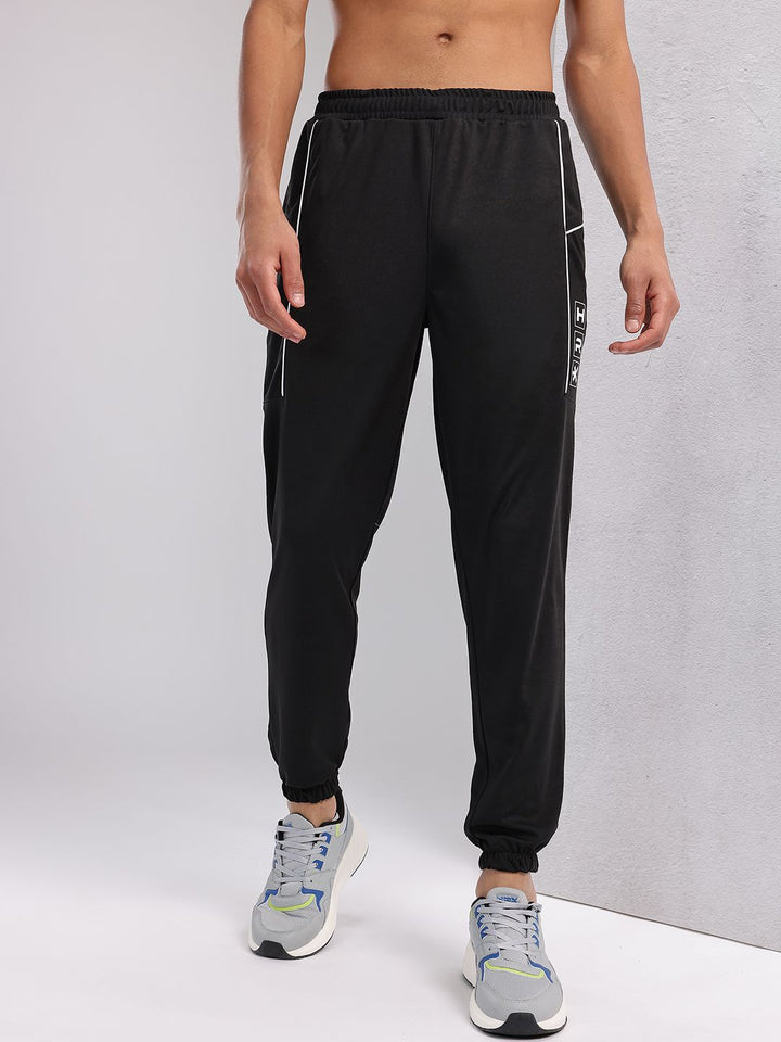 HRX by Hrithik Roshan Men Brand Logo Printed Mid-Rise Rapid-Dry Training Joggers