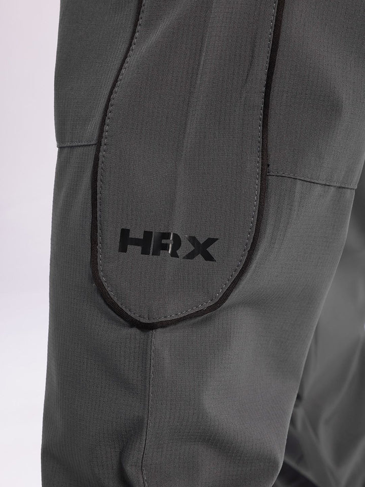 HRX oleh Hrithik Roshan Men Mid-Rise Rapid-Dry Paneled Stelyle Joggers