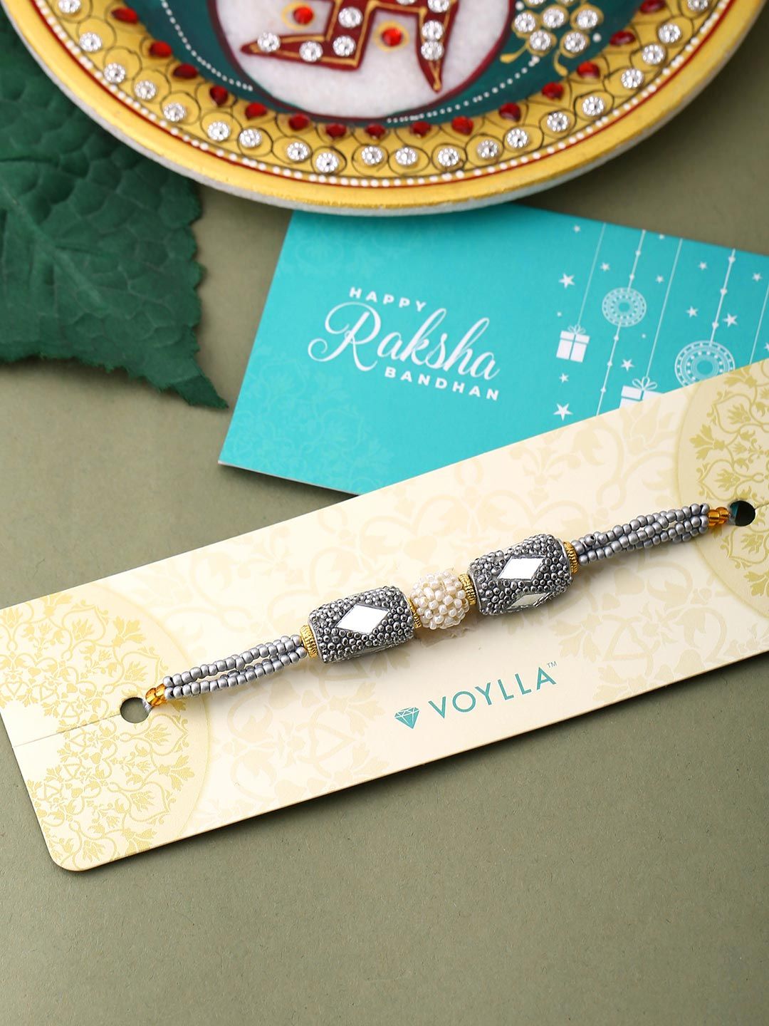 Voylla Unisex Silver Beaded and Pearls Rakhi with Roli Chaawal Pack