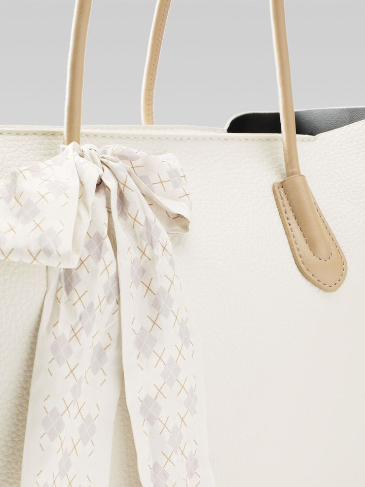 Lino Perros Textured Shoulder Bag with Bow Detail