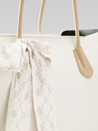 Lino Perros Textured Shoulder Bag with Bow Detail