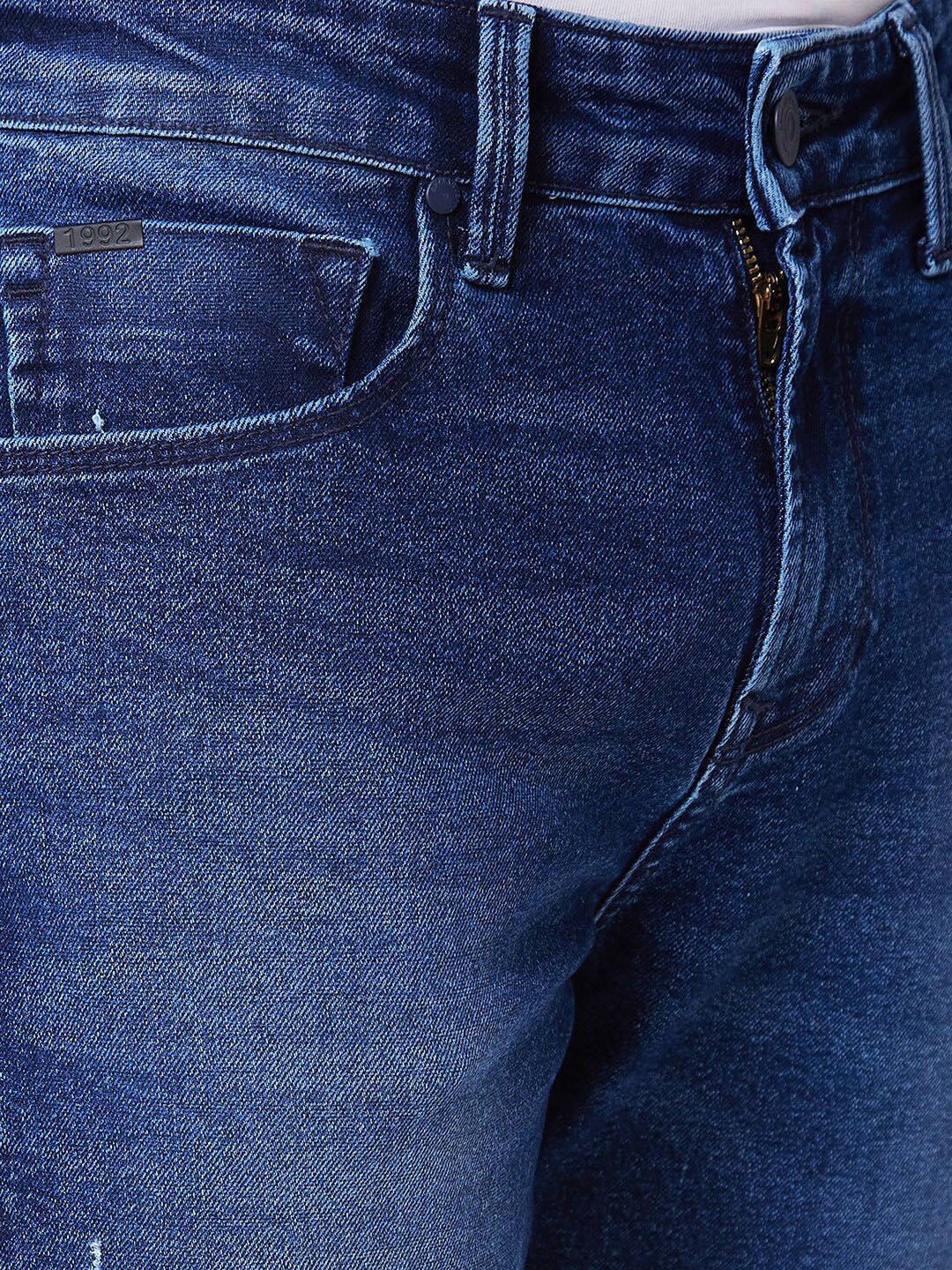 SPYKAR Men Tapered Fit Clean Look Light Fade Mid Rise Cotton Jeans