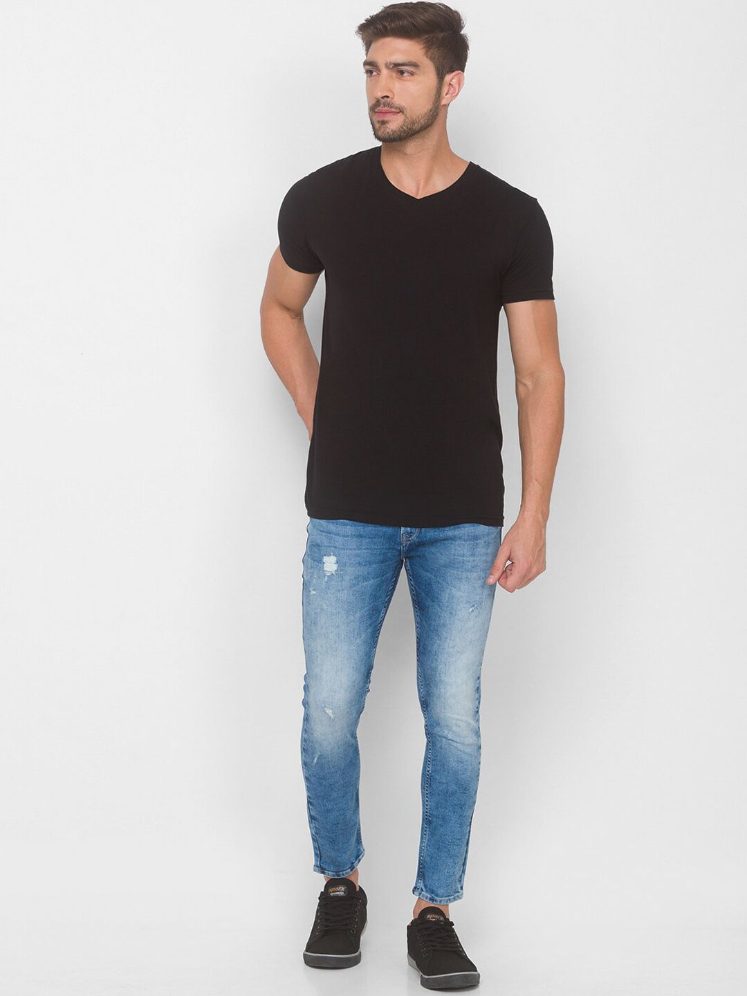 Spykar Men Blue Slim sesuai dengan seluar jeans pudar berat yang agak tertekan