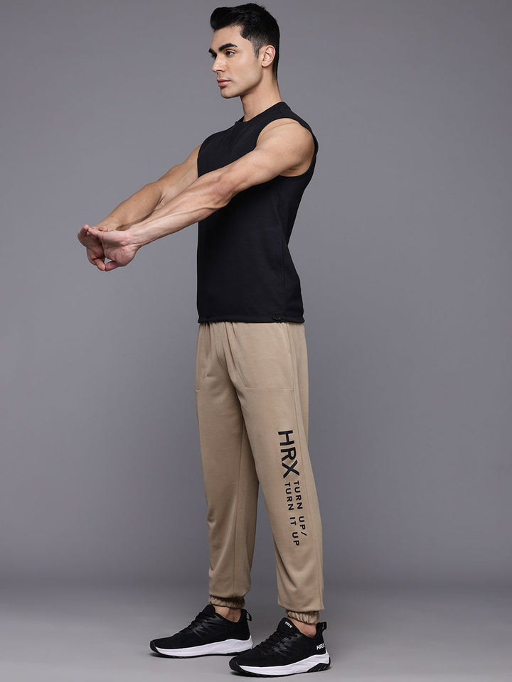 HRX by Hrithik Roshan Men Brand Logo Printed Mid-Rise Regular Fit Training Joggers