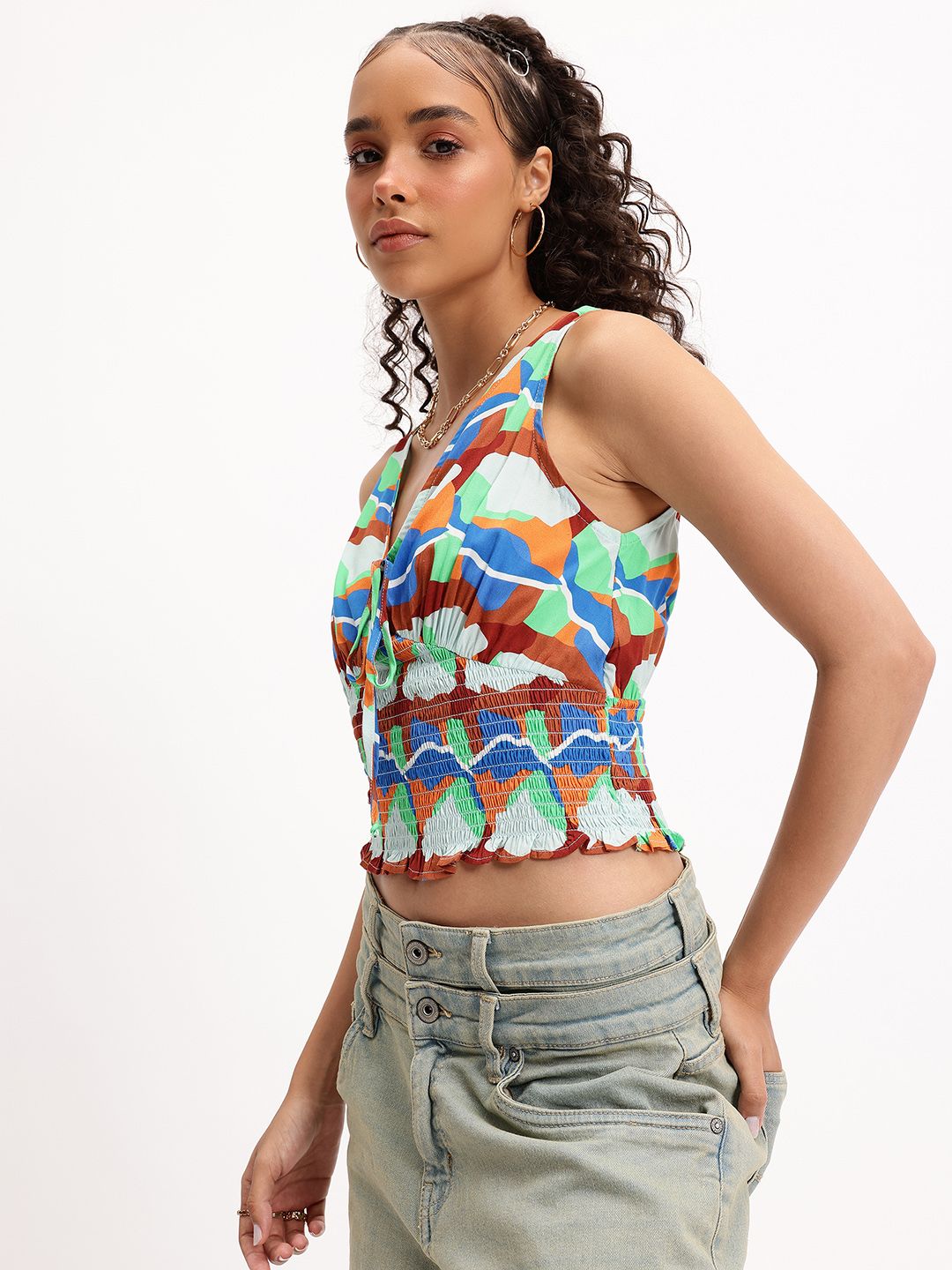 DressBerry Playful Palette  Abstract Printed Tie-Up Neck Smocked Top