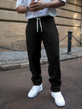 Powerlook Men Black Knitted Regular Fit Mid-Rise Cotton Track Pant