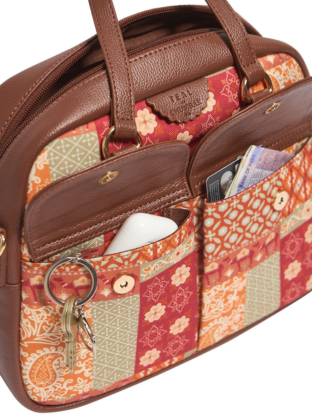 TEAL BY CHUMBAK Printed Half Moon Sling Bag with Cut Work
