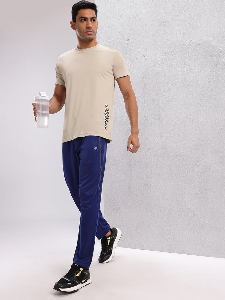 HRX by Hrithik Roshan Men Mid-Rise Rapid-Dry Fit Running Track Pants with Side Slits