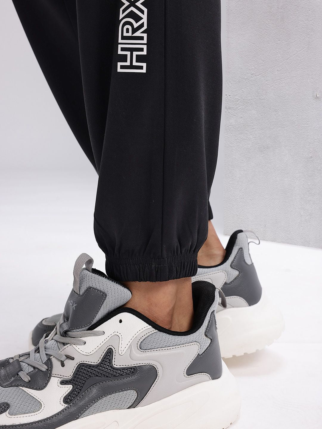HRX by Hrithik Roshan Men Brand Logo Printed Mid-Rise Rapid-Dry Running Joggers