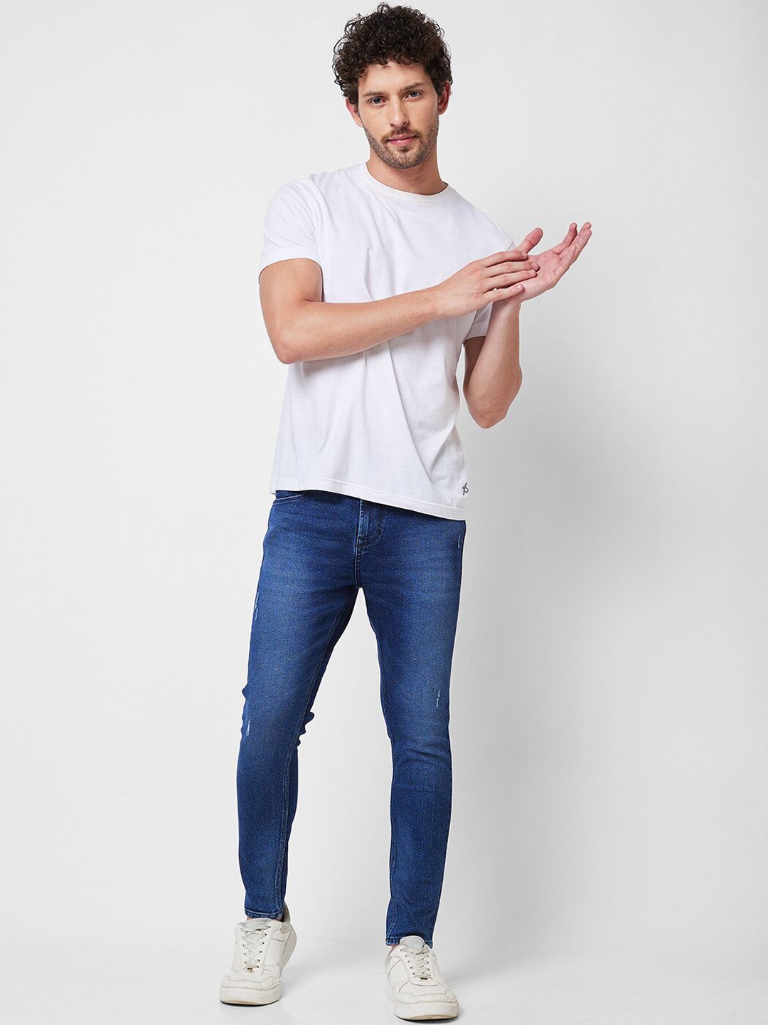 SPYKAR Men Tapered Fit Clean Look Light Fade Mid Rise Cotton Jeans