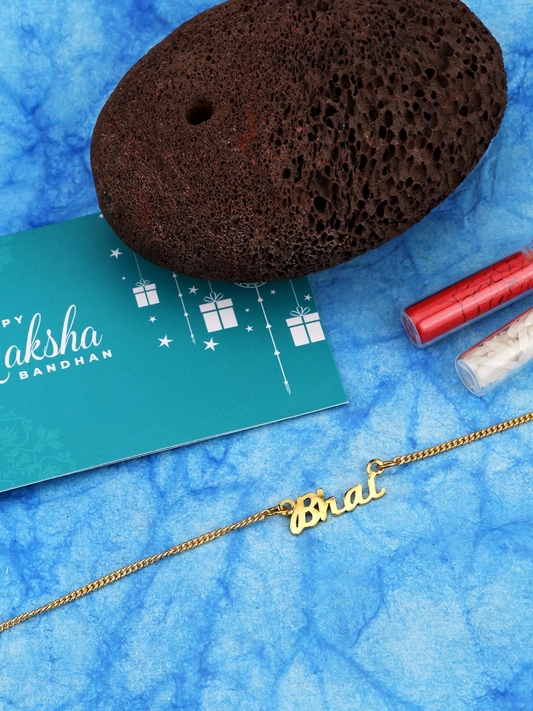 Voylla Gold-Toned Engraved with The Word 'Bhai' Rakhi Bracelet with Roli Chaawal Pack