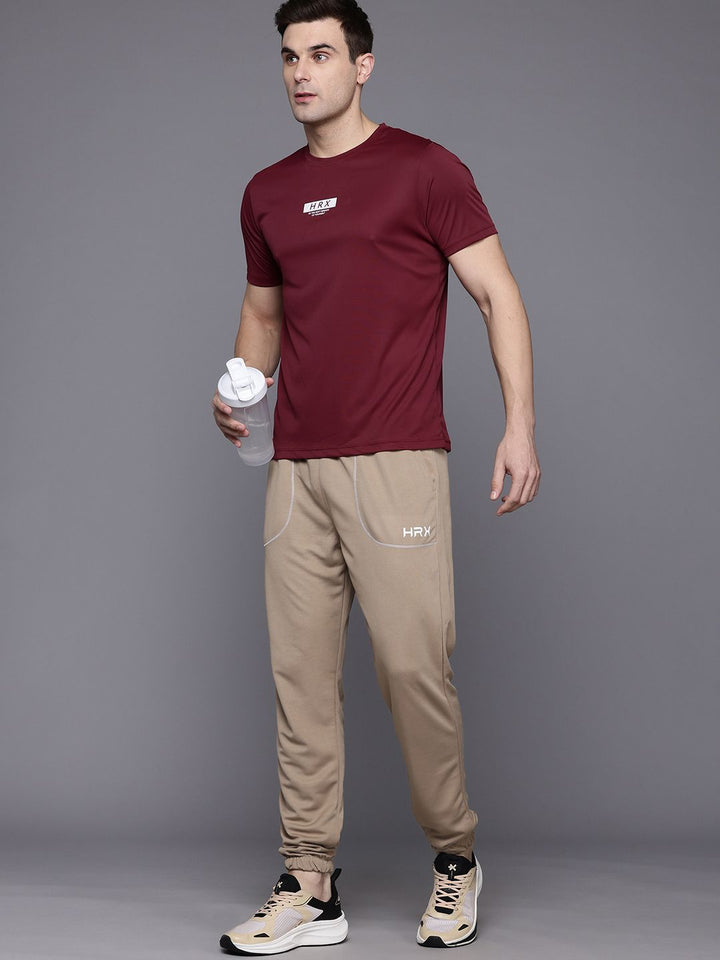 HRX by Hrithik Roshan Men Brand Logo Printed Detail Mid-Rise Rapid-Dry Training Joggers
