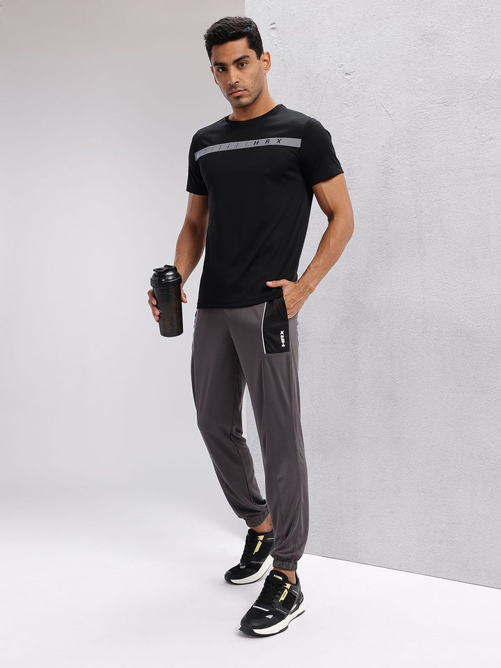 HRX by Hrithik Roshan Men Colourblocked Detail Mid-Rise Rapid-Dry Training Joggers