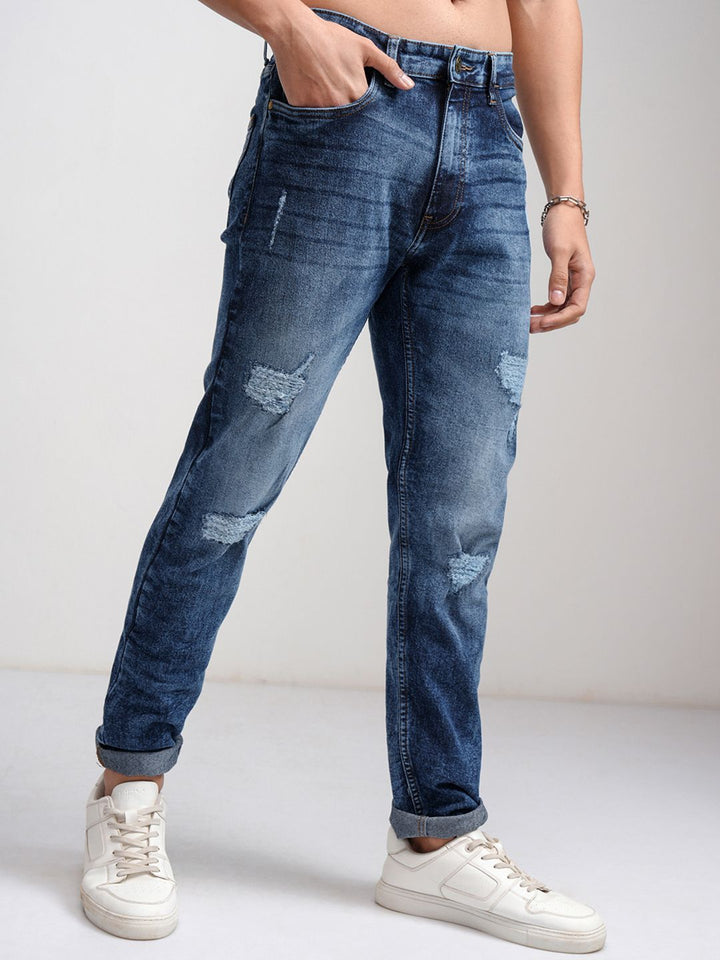 HIGHLANDER Men Blue Tapered Fit Mid-Rise Mildly Distressed Light Fade Stretchable Jeans
