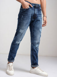 HIGHLANDER Men Blue Tapered Fit Mid-Rise Mildly Distressed Light Fade Stretchable Jeans