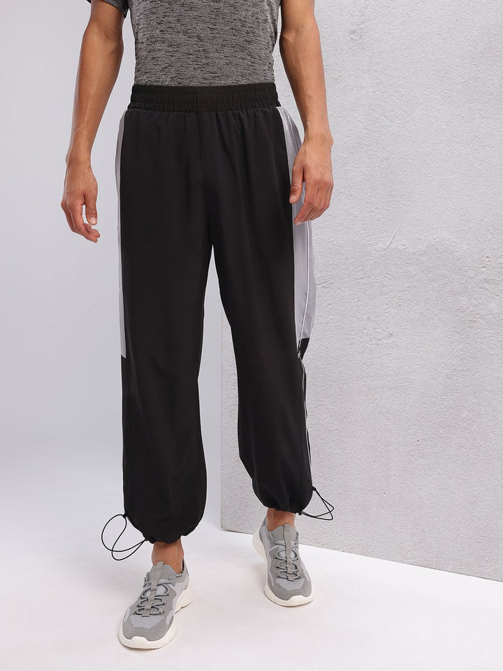 HRX by Hrithik Roshan Men Mid-Rise Colourblocked Lifestyle Track Pants with Toggle Hem