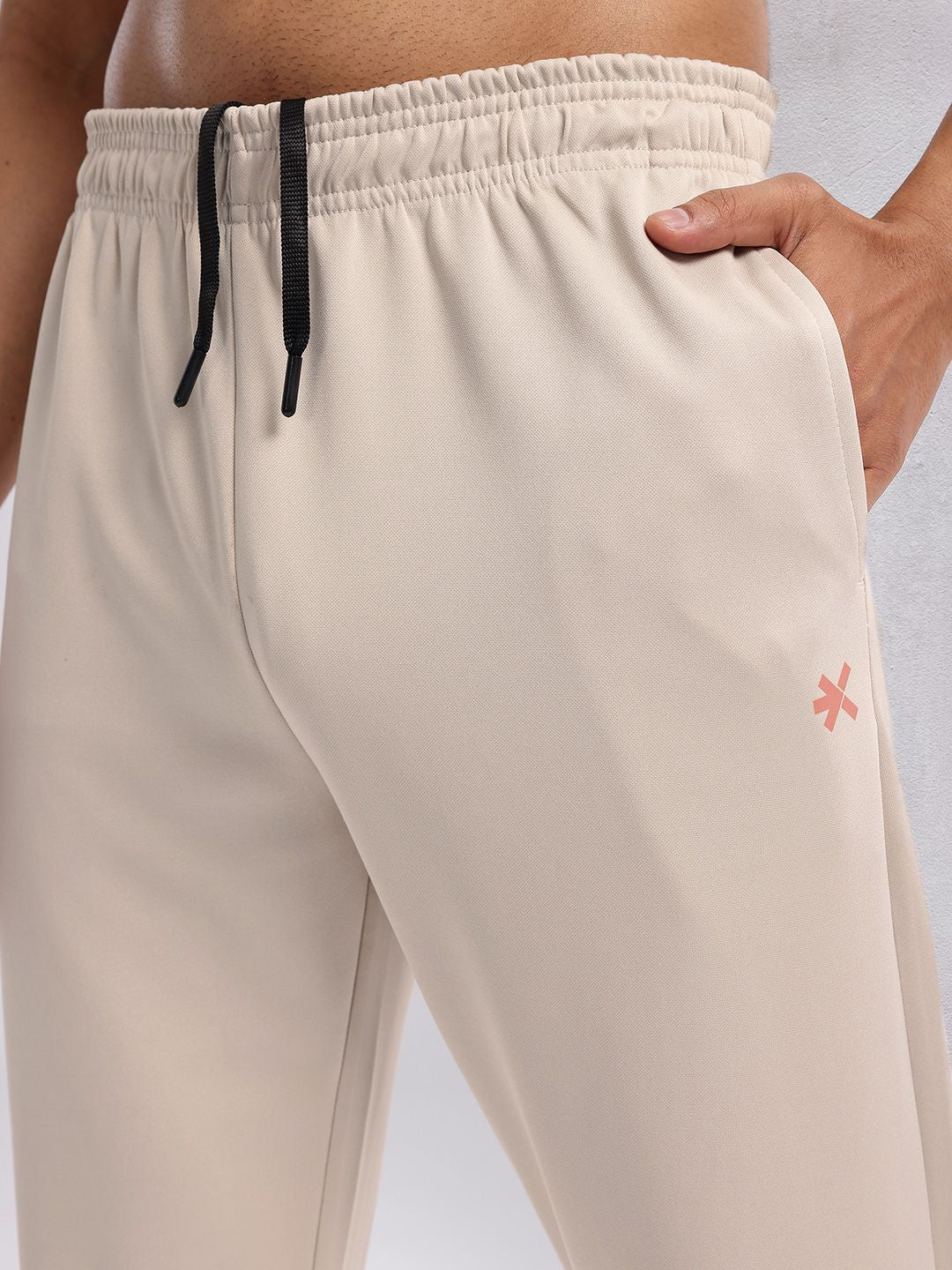 HRX by Hrithik Roshan Men Mid-Rise Rapid-Dry Running Track Pants with Side Taping Detail
