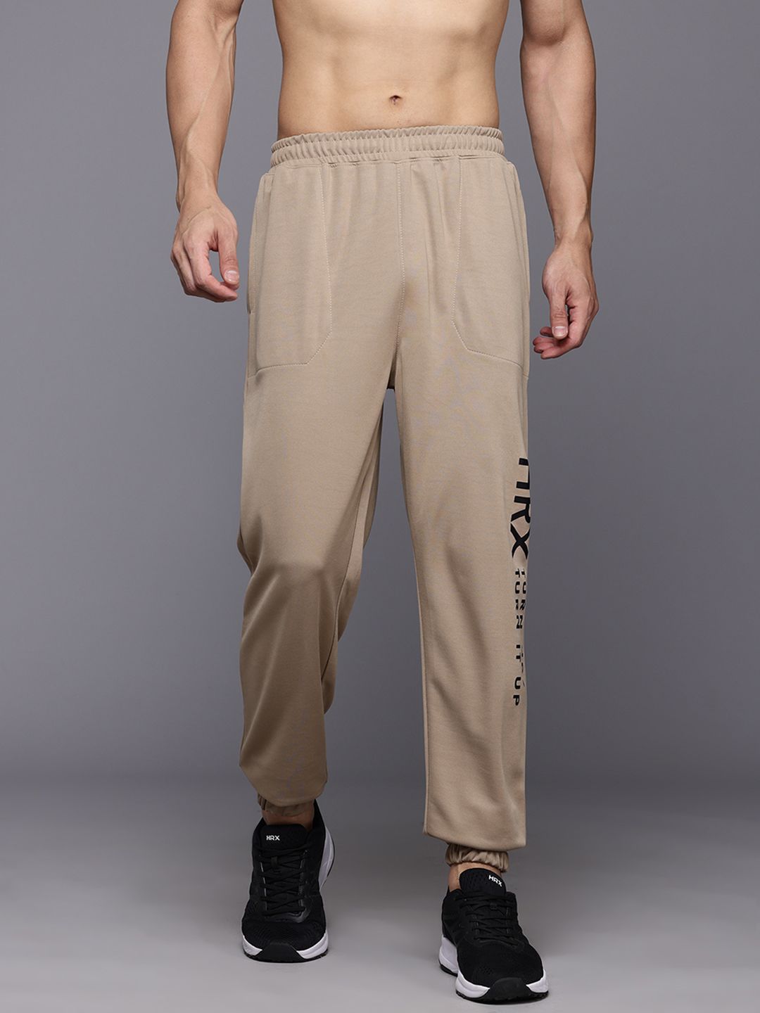 HRX by Hrithik Roshan Men Brand Logo Printed Mid-Rise Regular Fit Training Joggers