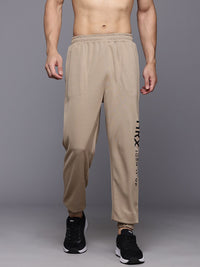 HRX by Hrithik Roshan Men Brand Logo Printed Mid-Rise Regular Fit Training Joggers