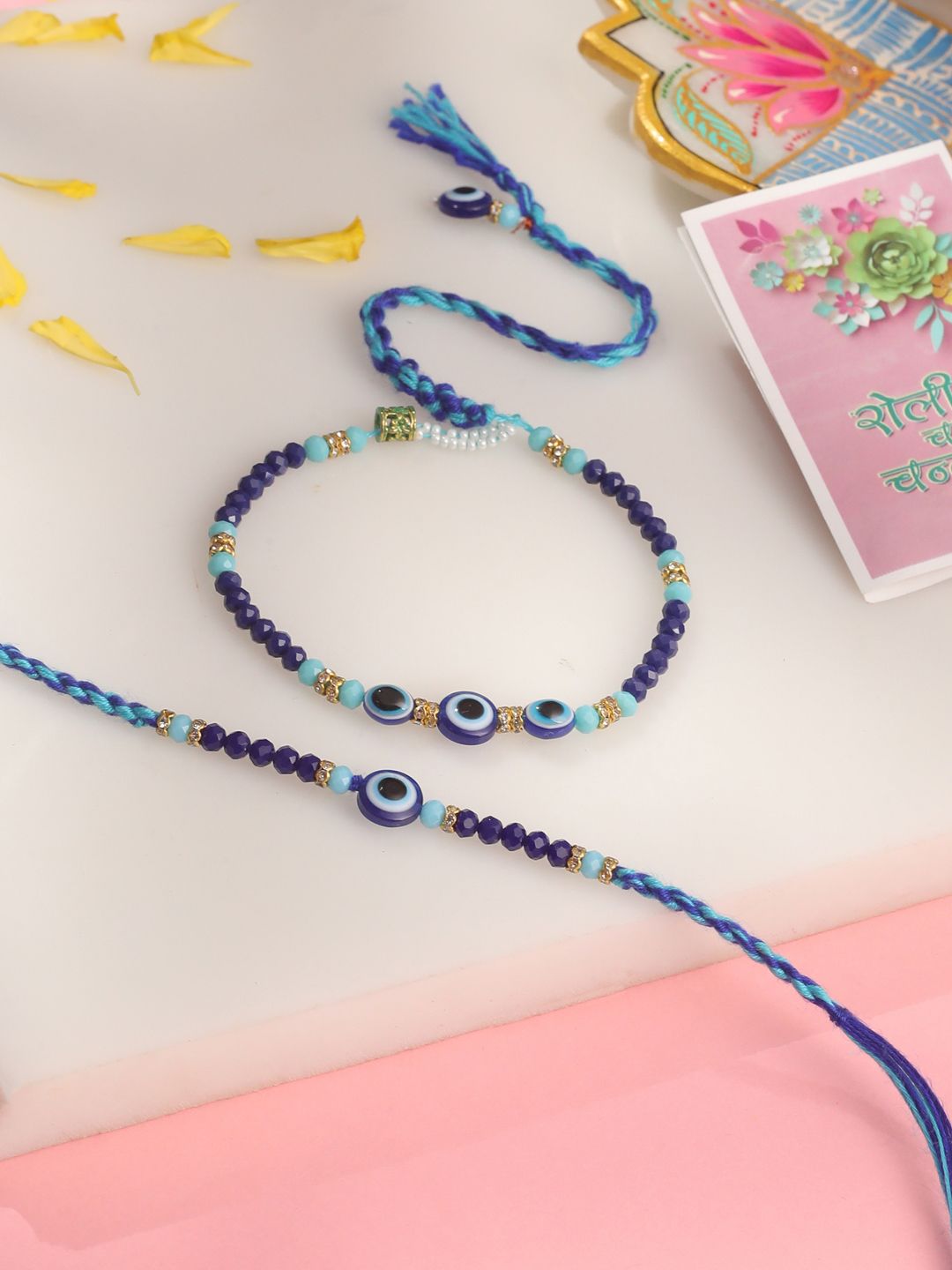 NVR Set of 2 Blue Evil Eye Artificial Beads Bhaiya Bhabhi Rakhi with Roli Chawal