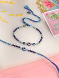 NVR Set of 2 Blue Evil Eye Artificial Beads Bhaiya Bhabhi Rakhi with Roli Chawal