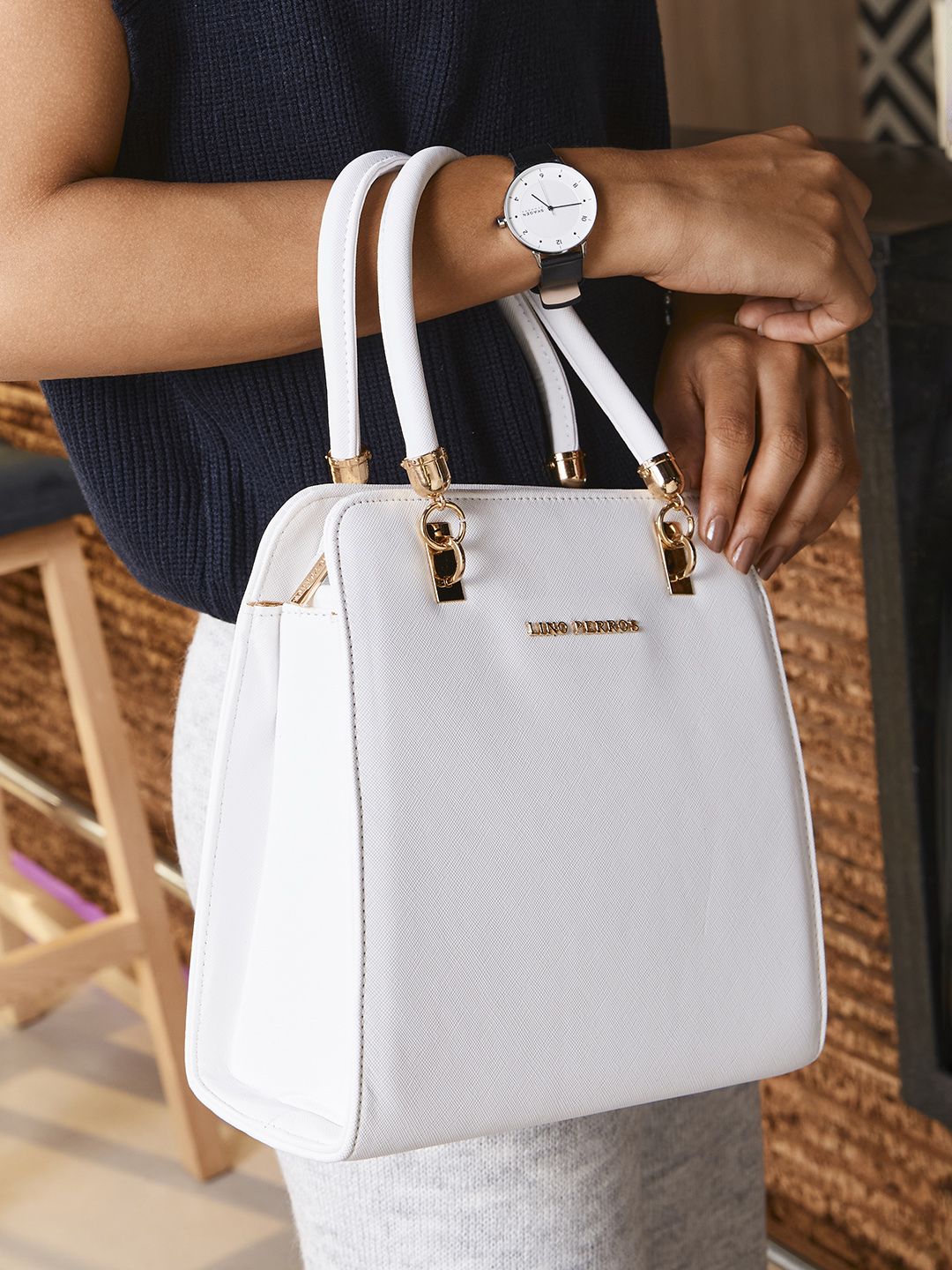 Lino Perros White Solid Handheld Bag