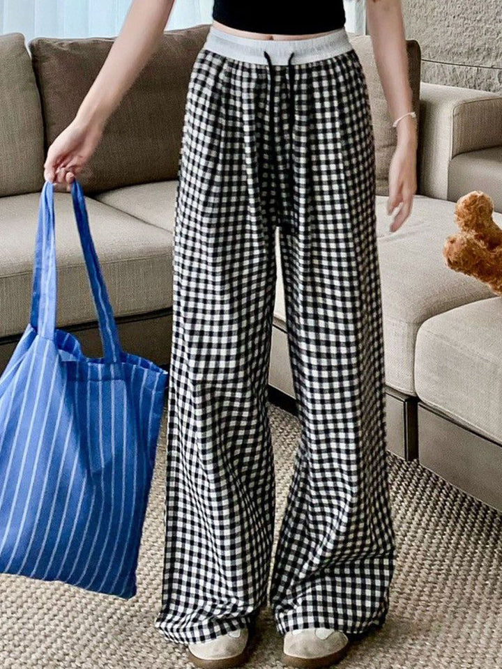 Wanita Dressberry memeriksa seluar kaki lebar longgar pertengahan